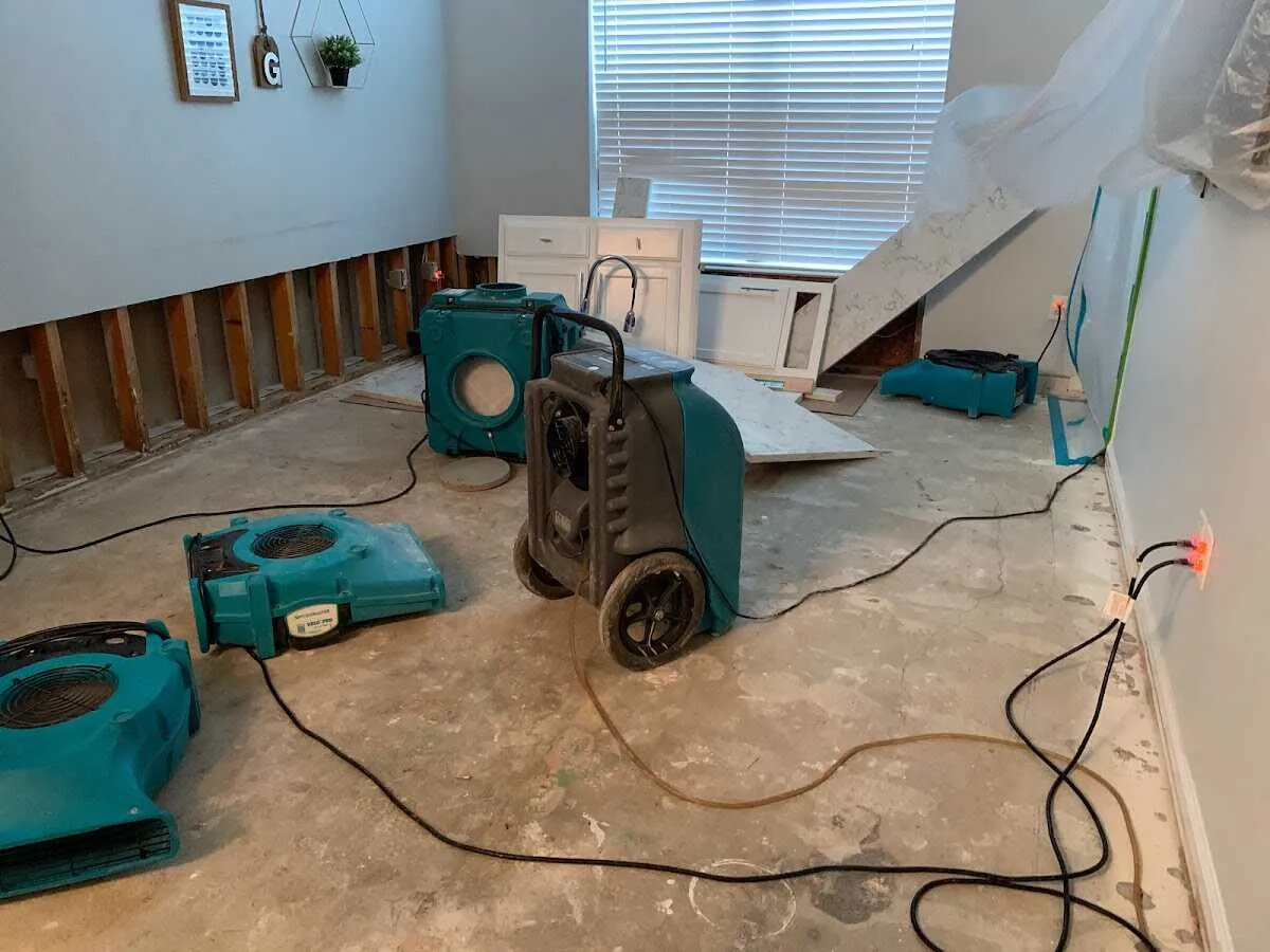 Dehumidifier in flood-cut room for Water Damage Restoration in North Ogden